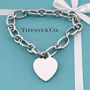 Authentic Tiffany & Co. Oval Clasp Link Bracelet with Blank Silver Heart Charm